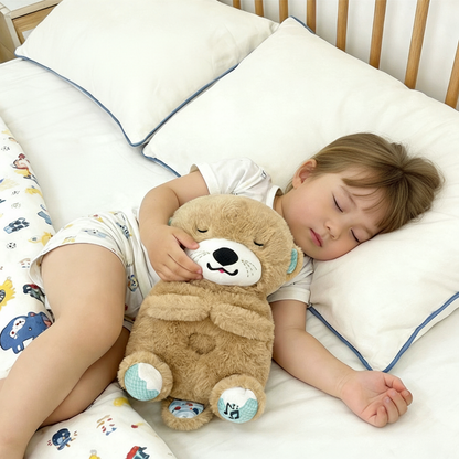 Niña durmiendo con peluche nutria